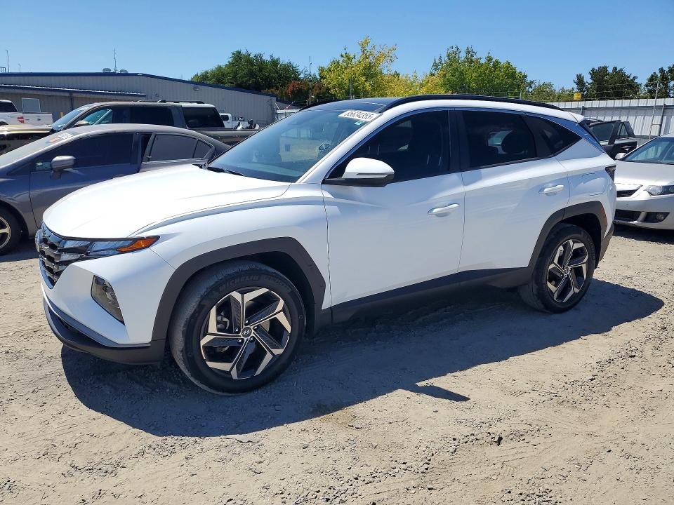 HYUNDAI TUCSON 2022 with VIN KM8JFCA1XNU052176 - Photo from auction