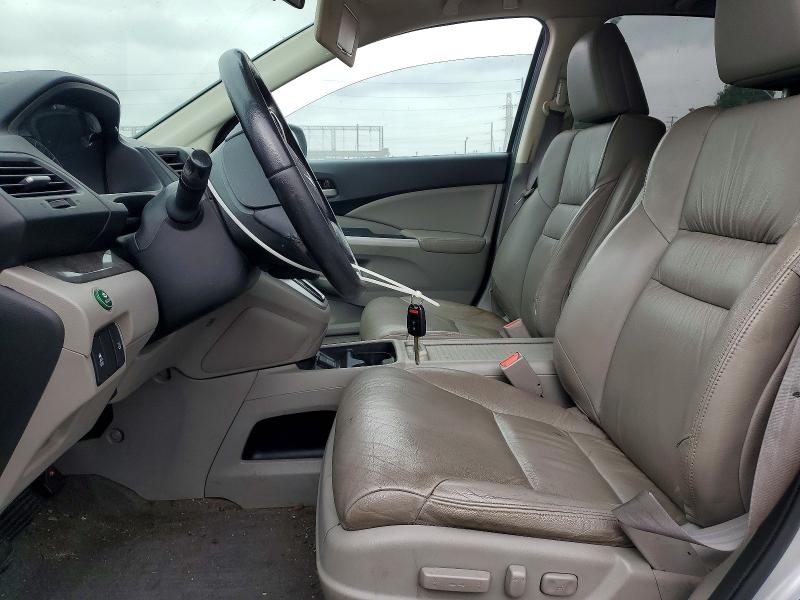 Photo 7 from auction – 2014 HONDA CR-V with VIN 2HKRM3H74EH559365
