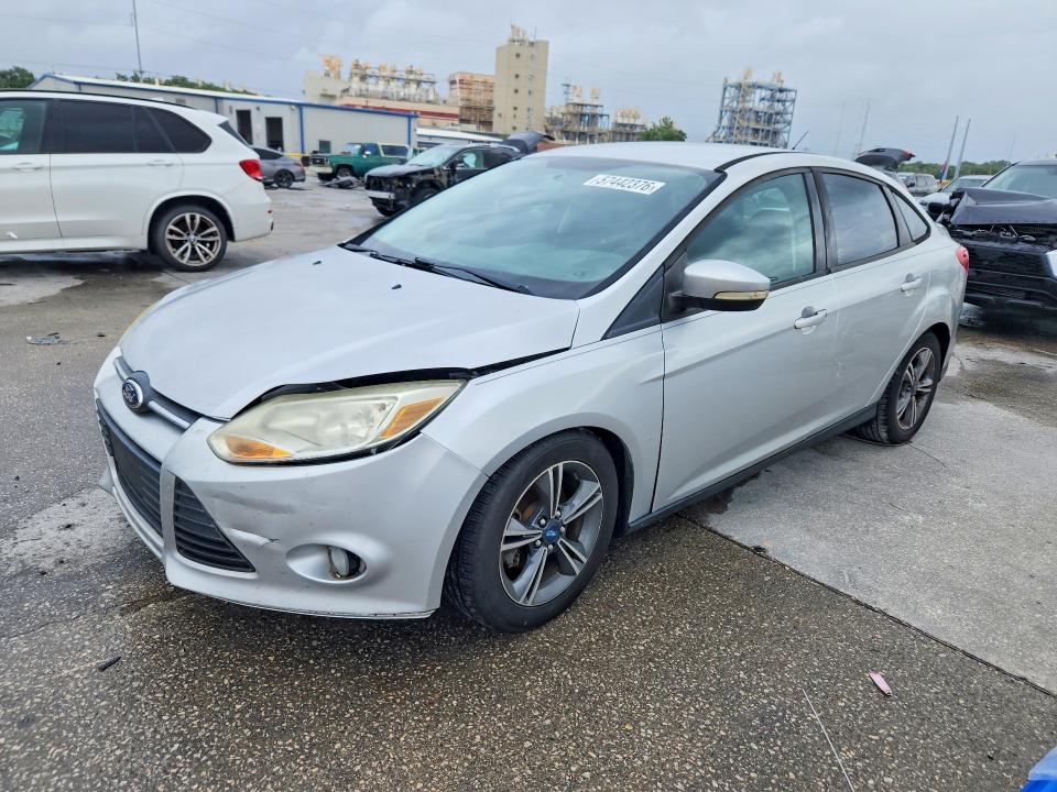 FORD FOCUS 2014 with VIN 1FADP3F23EL142118 - Photo from auction