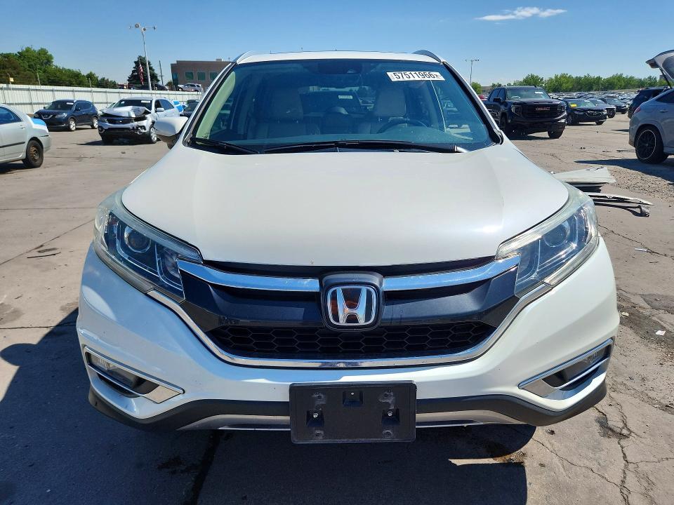 Photo 5 from auction – 2016 HONDA CR-V with VIN 5J6RM4H97GL012736