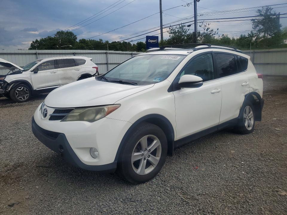 TOYOTA RAV4 2014 with VIN 2T3RFREV2EW211086 - Photo from auction