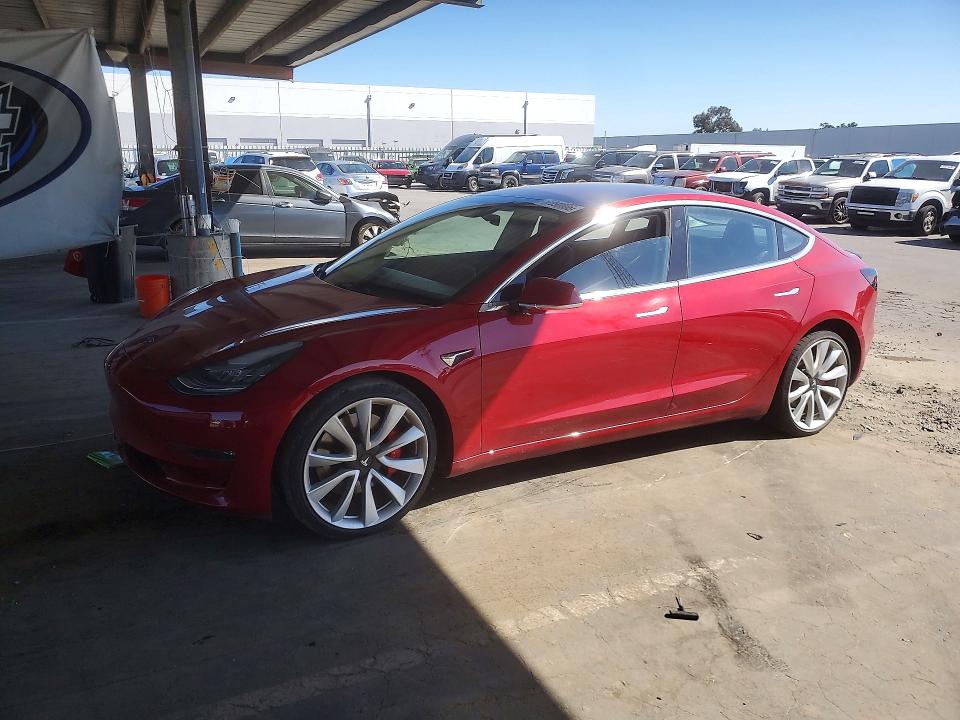 TESLA MODEL 3 2018 with VIN 5YJ3E1EB4JF083742 - Photo from auction