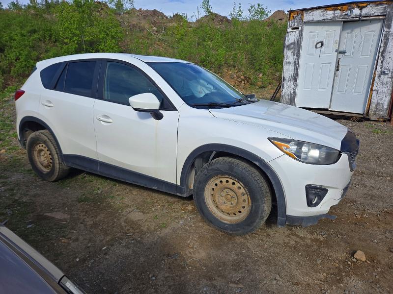 Photo 4 from auction – 2014 MAZDA CX-5 with VIN JM3KE4DY7E0308038