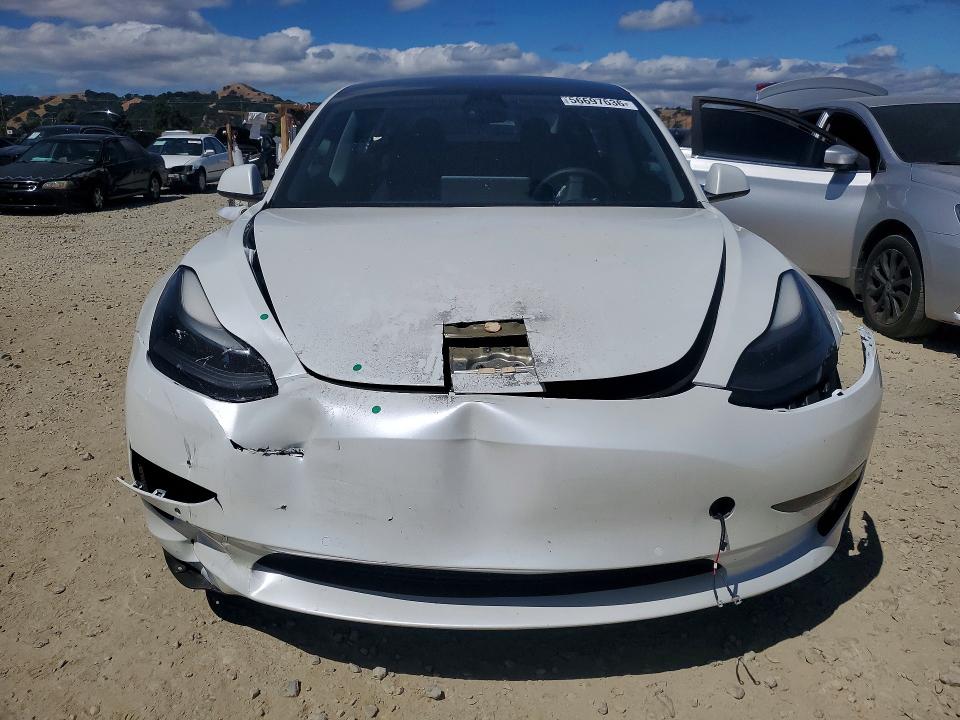 Photo 5 from auction – 2021 TESLA MODEL 3 with VIN 5YJ3E1EA7MF077574