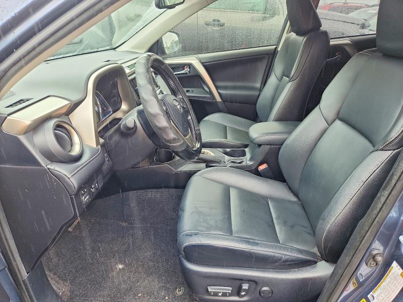 Photo 7 from auction – 2014 TOYOTA RAV4 with VIN JTMYFREV9ED033153