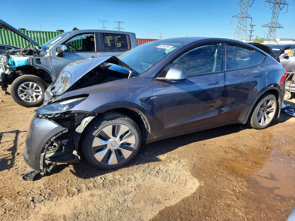 TESLA MODEL Y 2023 with VIN 7SAYGDEE9PF874307 - Photo from auction