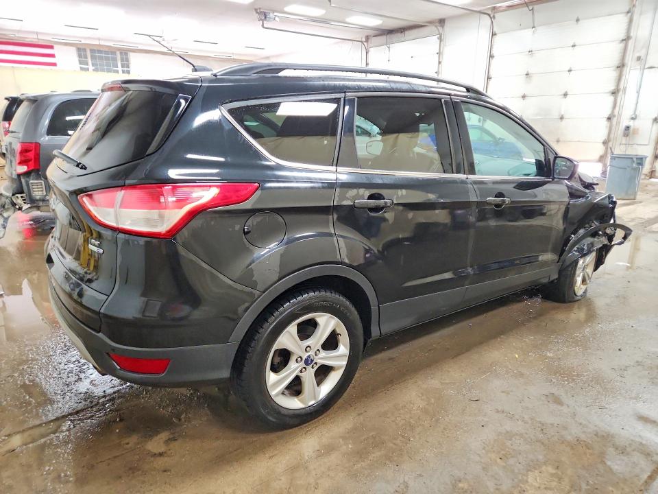 Photo 3 from auction – 2014 FORD ESCAPE with VIN 1FMCU9G9XEUC87384