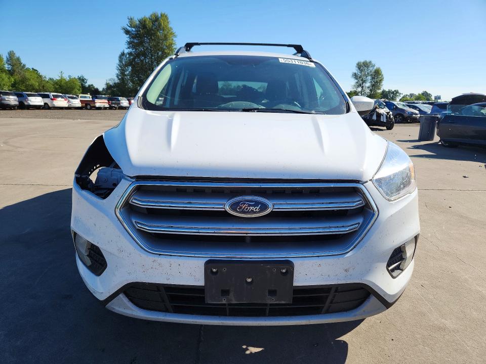 Photo 5 from auction – 2017 FORD ESCAPE with VIN 1FMCU9GD1HUA52039