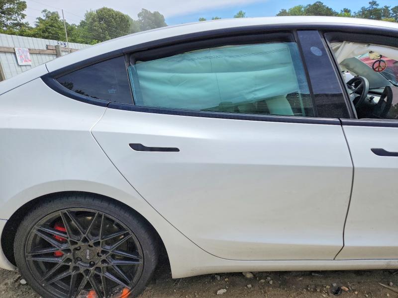 Photo 10 from auction – 2021 TESLA MODEL 3 with VIN 5YJ3E1EC4MF033243