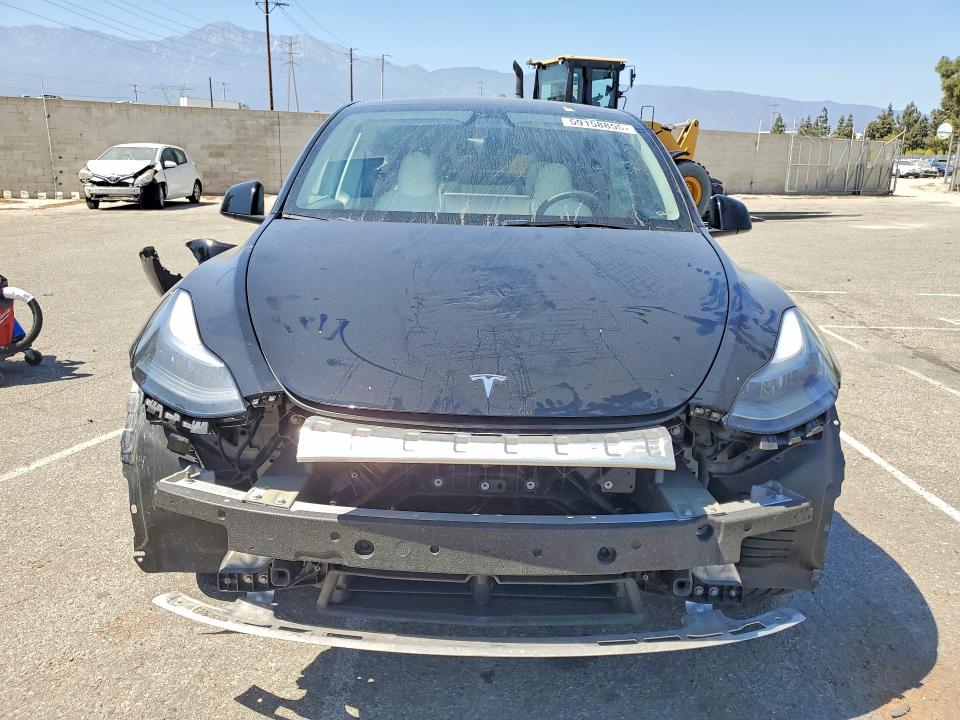 Photo 5 from auction – 2023 TESLA MODEL Y with VIN 7SAYGDED3PF980193