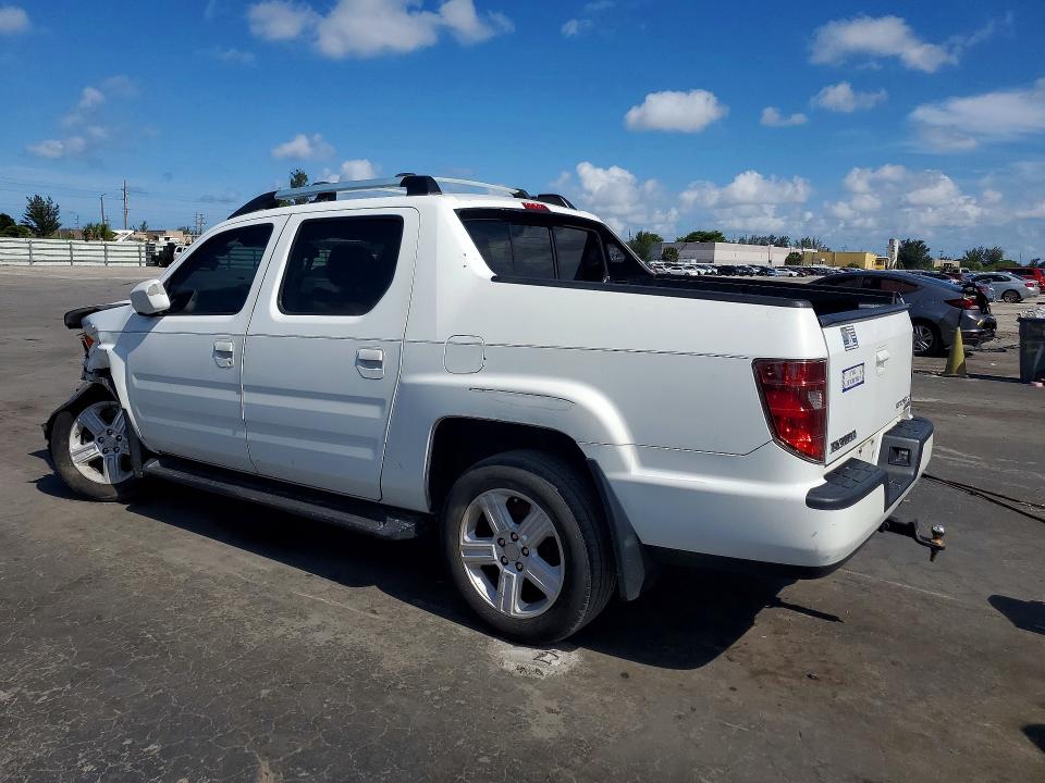 Photo 2 from auction – 2014 HONDA RIDGELINE with VIN 5FPYK1F51EB001339