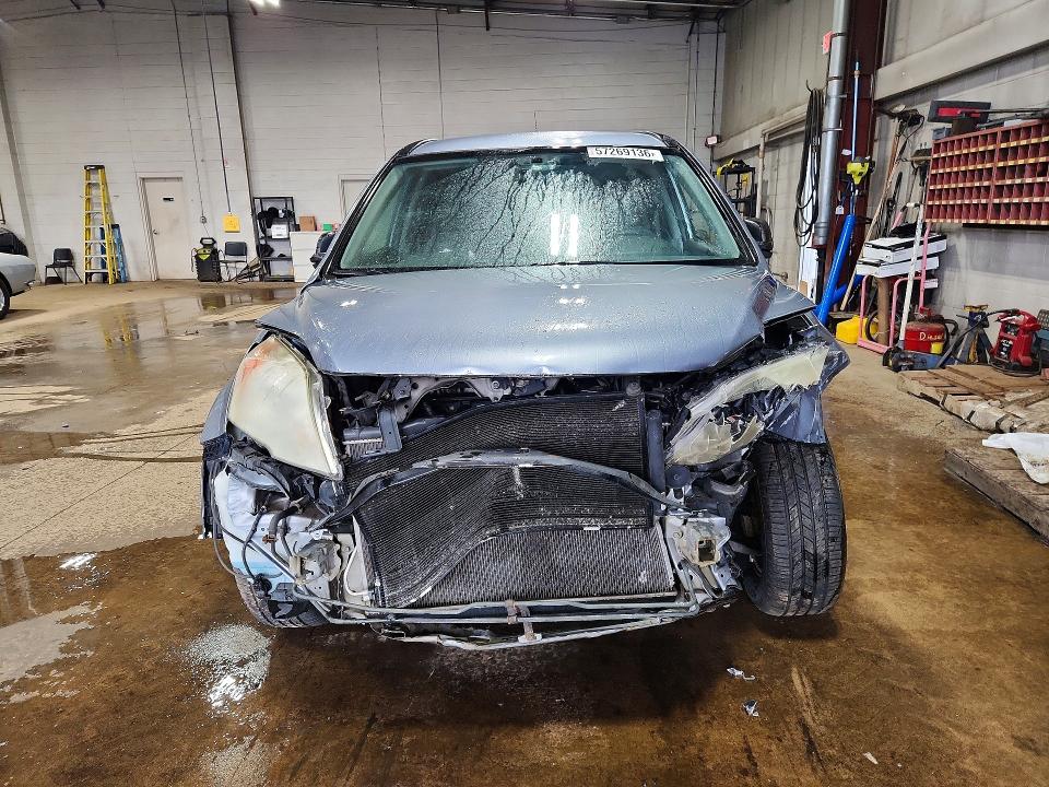 Photo 5 from auction – 2011 HONDA CR-V with VIN 5J6RE4H41BL020177