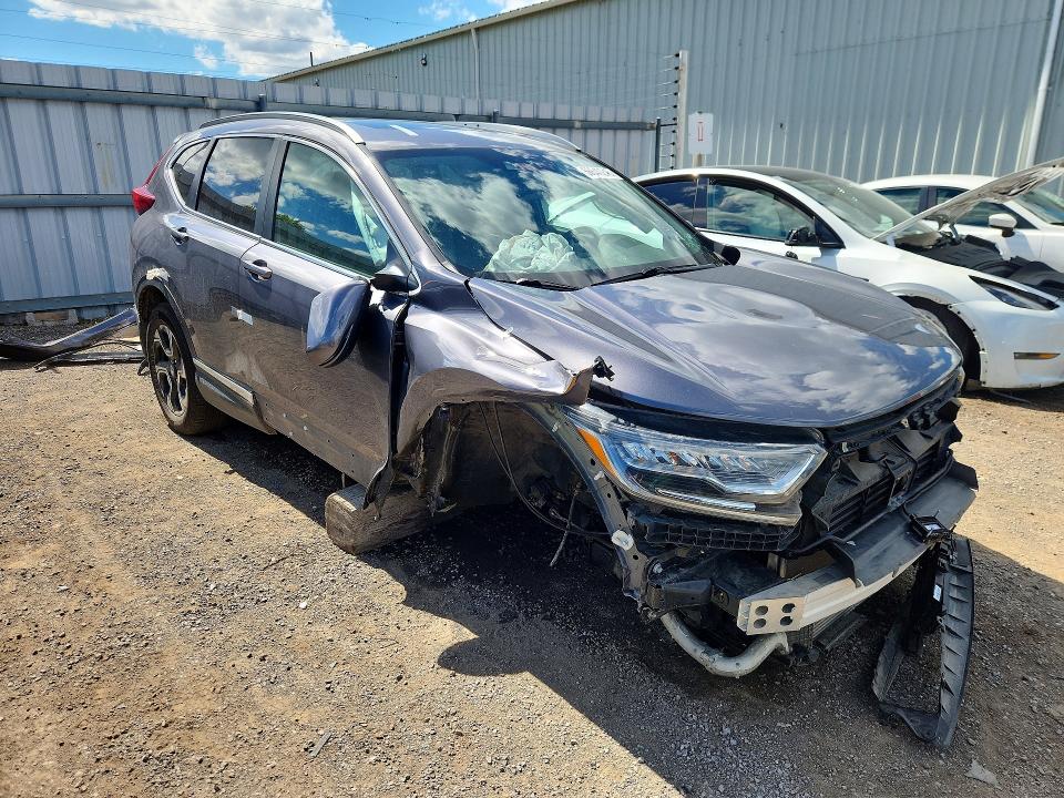 Photo 4 from auction – 2018 HONDA CR-V with VIN 2HKRW2H98JH137308