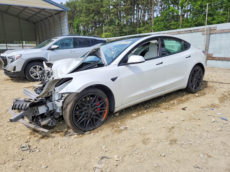 TESLA MODEL 3 2021 with VIN 5YJ3E1EC4MF033243 - Photo from auction