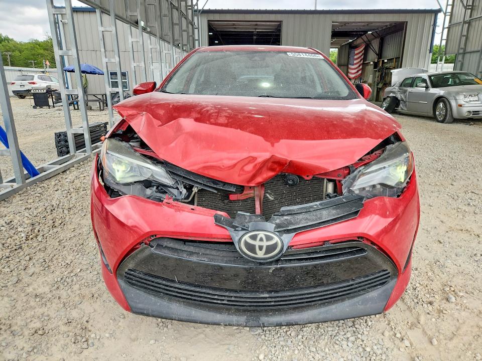 Снимка 5 от търг – 2018 TOYOTA COROLLA с VIN 5YFBURHE0JP767601