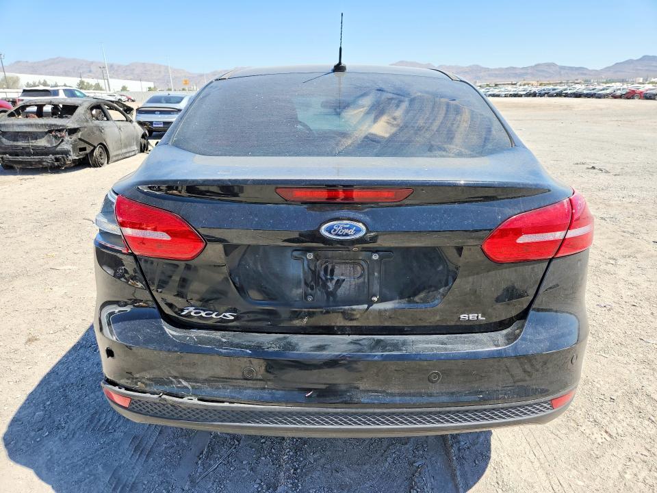 Photo 6 from auction – 2018 FORD FOCUS with VIN 1FADP3H26JL217482