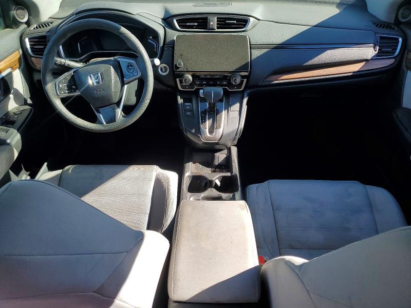 Photo 8 from auction – 2018 HONDA CR-V with VIN 7FARW1H58JE005126