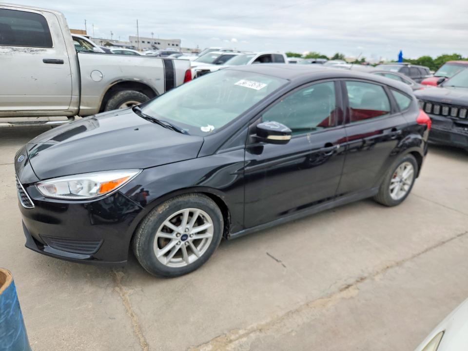 FORD FOCUS 2015 with VIN 1FADP3K23FL377092 - Photo from auction