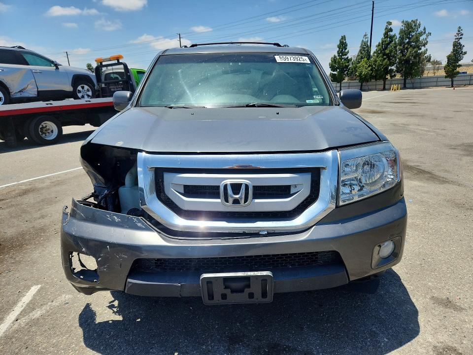 Photo 5 from auction – 2011 HONDA PILOT with VIN 5FNYF4H9XBB090886