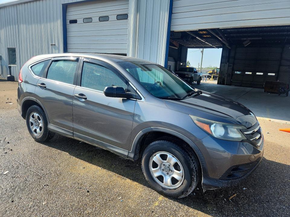 Photo 4 from auction – 2014 HONDA CR-V with VIN 3CZRM3H30EG711352