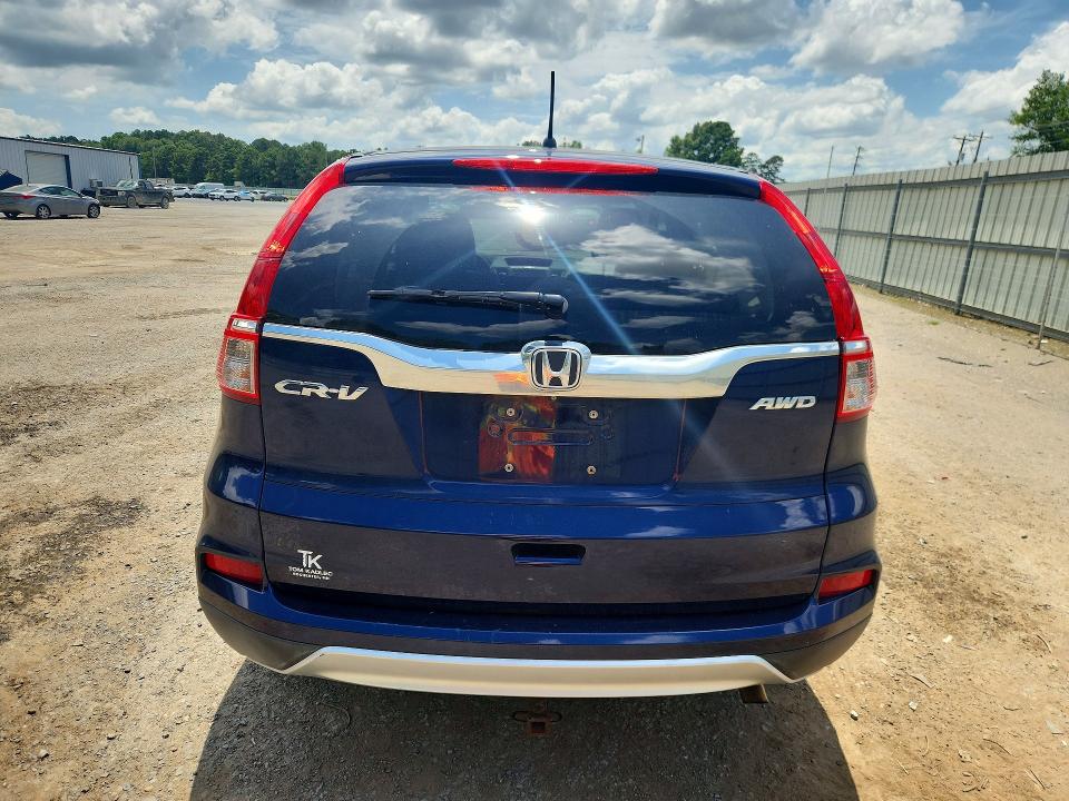Photo 6 from auction – 2016 HONDA CR-V with VIN 5J6RM4H59GL137833