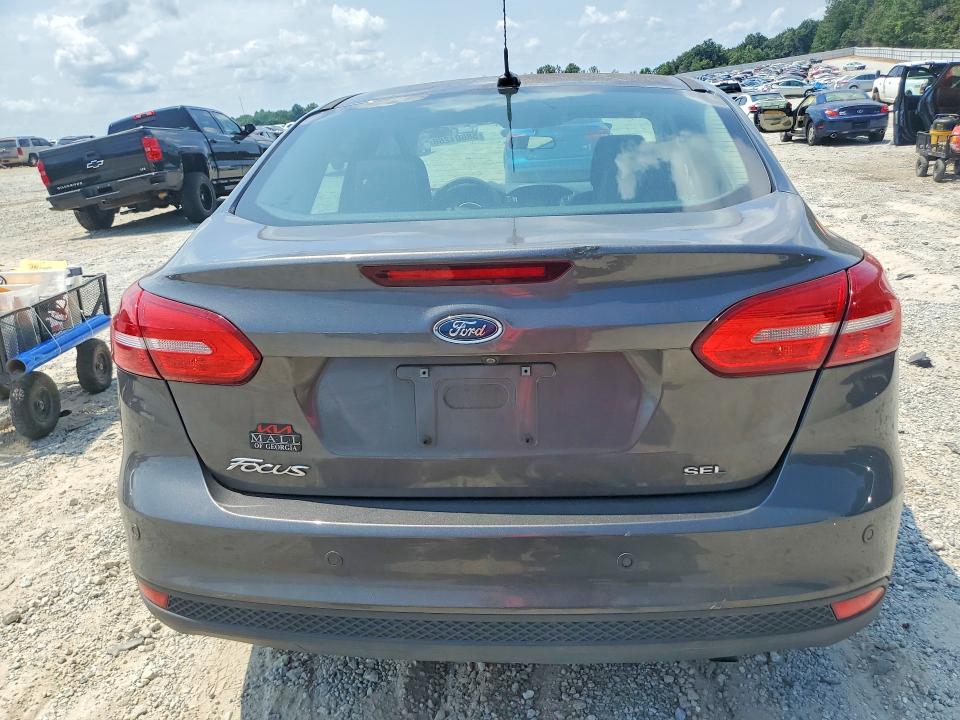 Photo 6 from auction – 2018 FORD FOCUS with VIN 1FADP3H21JL220029
