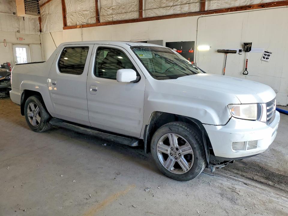 Photo 4 from auction – 2012 HONDA RIDGELINE with VIN 5FPYK1F57CB452854