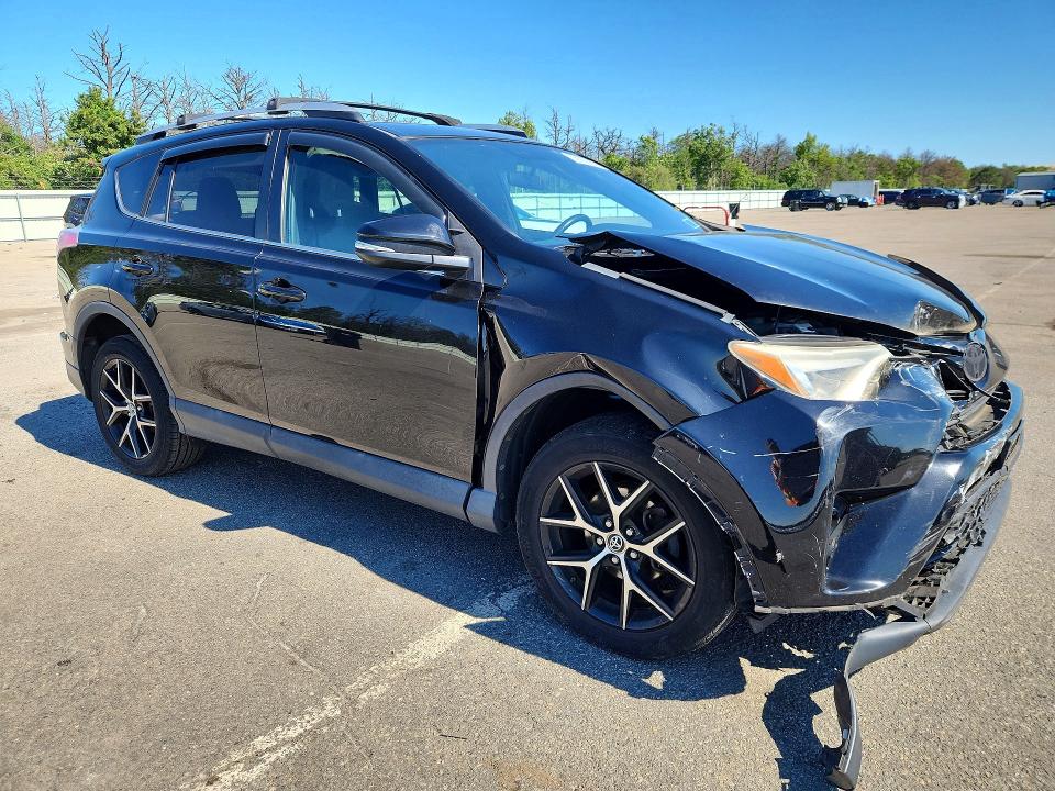 Photo 4 from auction – 2016 TOYOTA RAV4 with VIN 2T3JFREV6GW469143