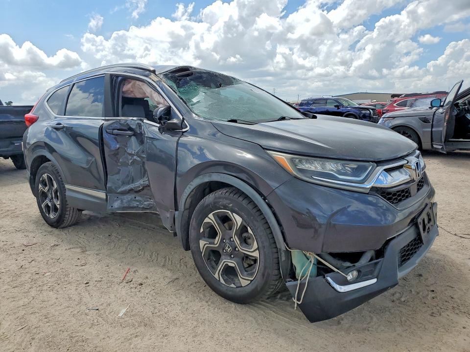 Photo 4 from auction – 2017 HONDA CR-V with VIN 2HKRW2H93HH646622