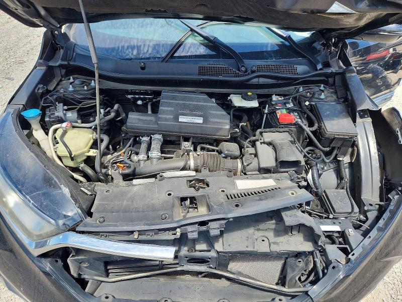 Photo 12 from auction – 2018 HONDA CR-V with VIN 7FARW2H99JE061729