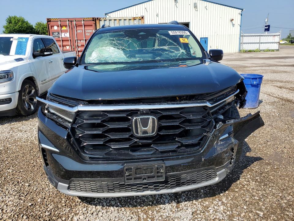 Photo 5 from auction – 2023 HONDA PILOT with VIN 5FNYG1H76PB504067