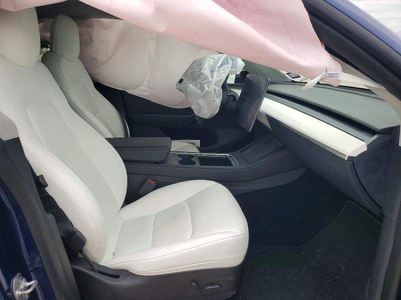 Photo 7 from auction – 2023 TESLA MODEL Y with VIN 7SAYGAEEXPF647190