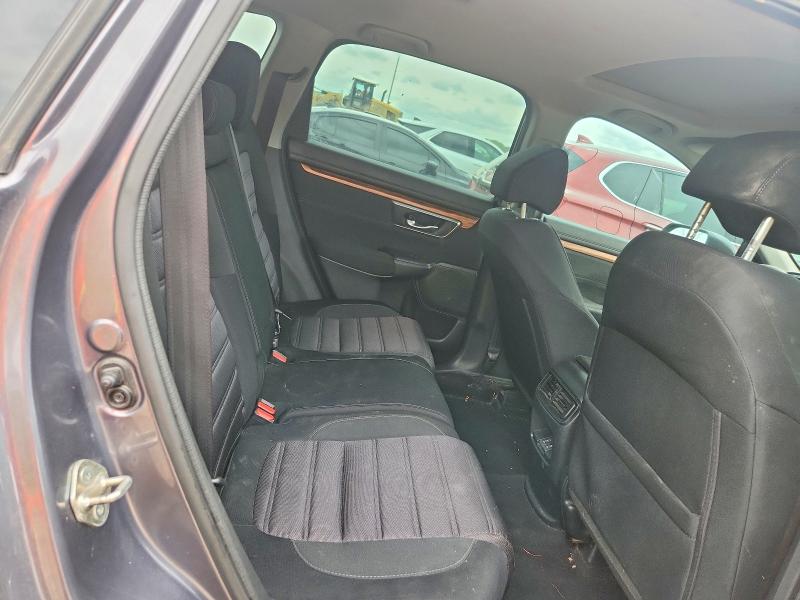 Photo 11 from auction – 2018 HONDA CR-V with VIN 5J6RW1H57JA011627