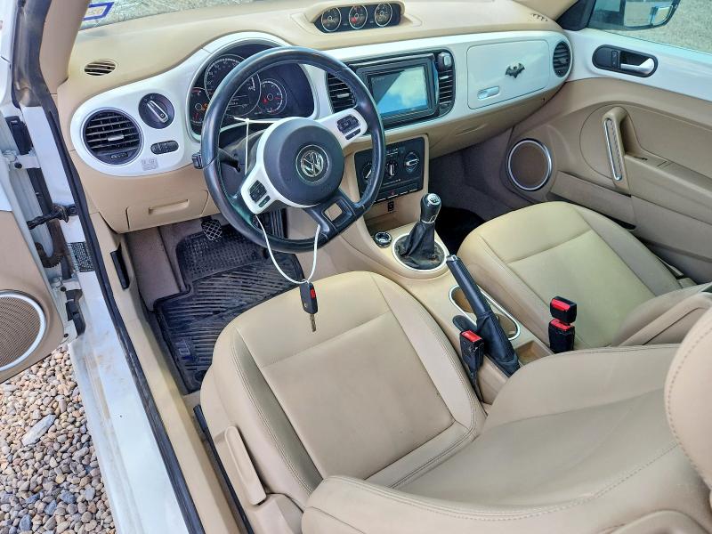 Photo 8 from auction – 2014 VOLKSWAGEN BEETLE with VIN 3VWRL7AT9EM654884