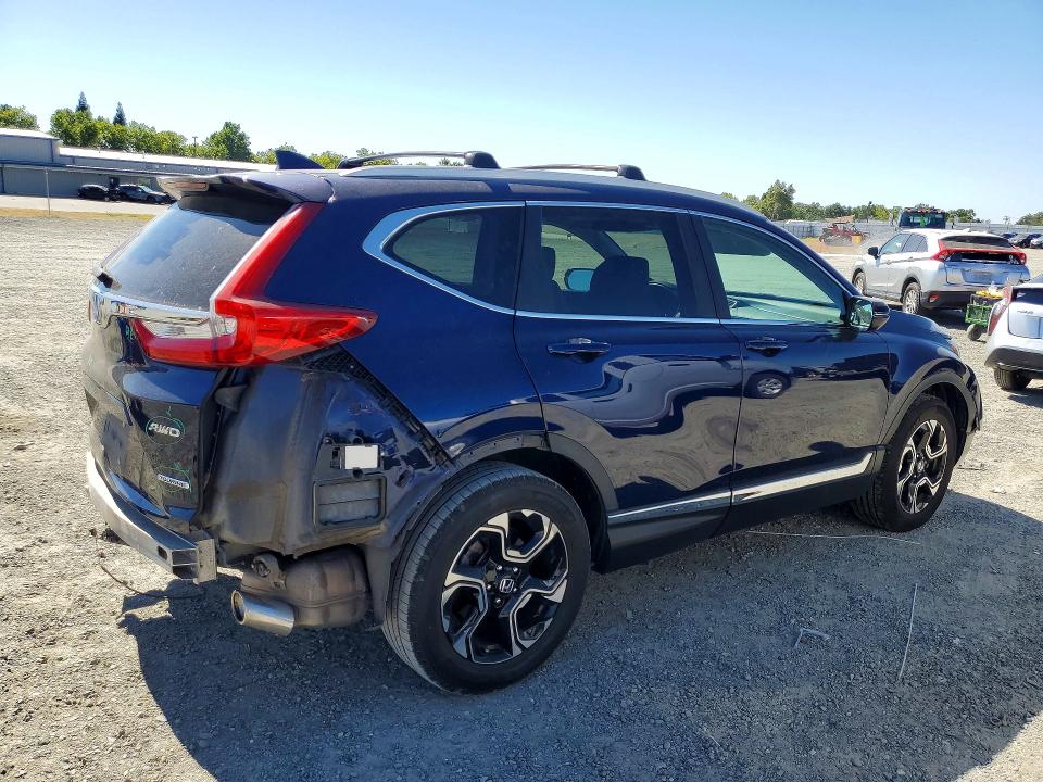 Photo 3 from auction – 2018 HONDA CR-V with VIN 7FARW2H96JE095613