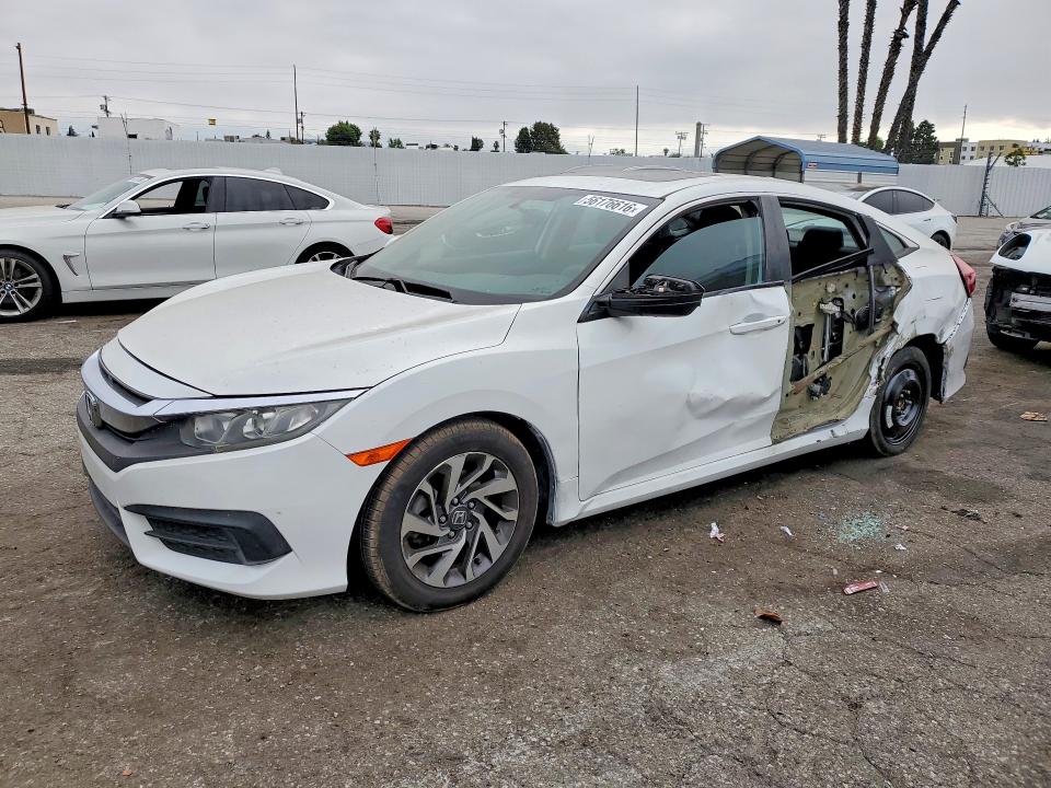 HONDA CIVIC 2017 with VIN 19XFC2F75HE002962 - Photo from auction