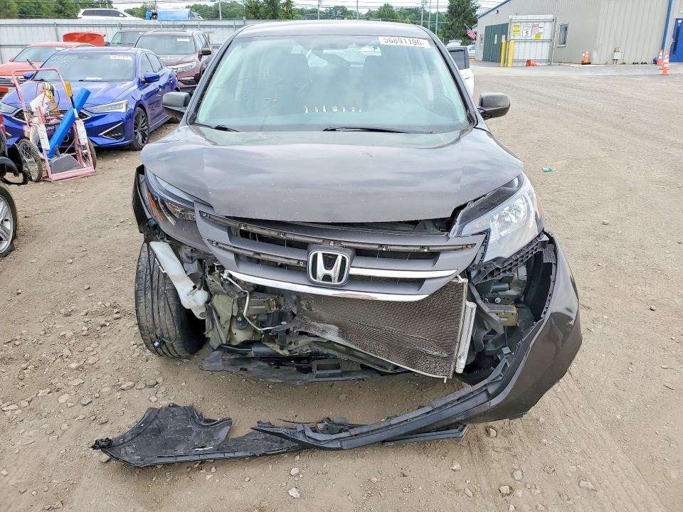Photo 5 from auction – 2014 HONDA CR-V with VIN 2HKRM4H3XEH661529