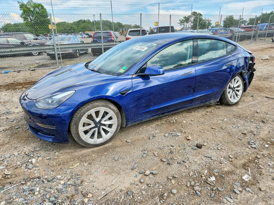 TESLA 3 2022 with VIN 5YJ3E1EA7NF185940 - Photo from auction