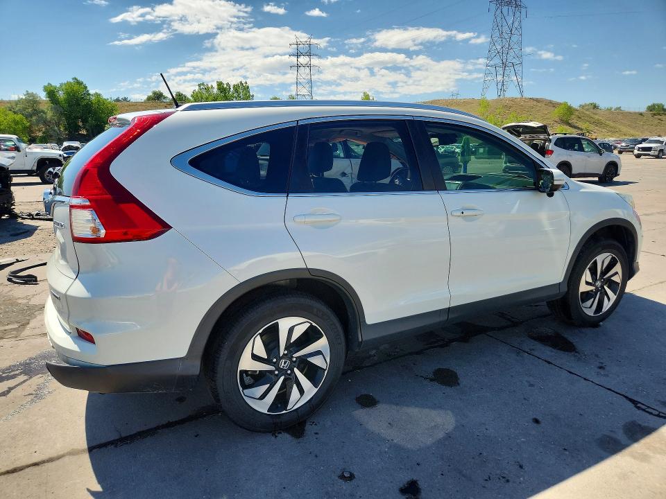 Photo 3 from auction – 2016 HONDA CR-V with VIN 5J6RM4H97GL012736