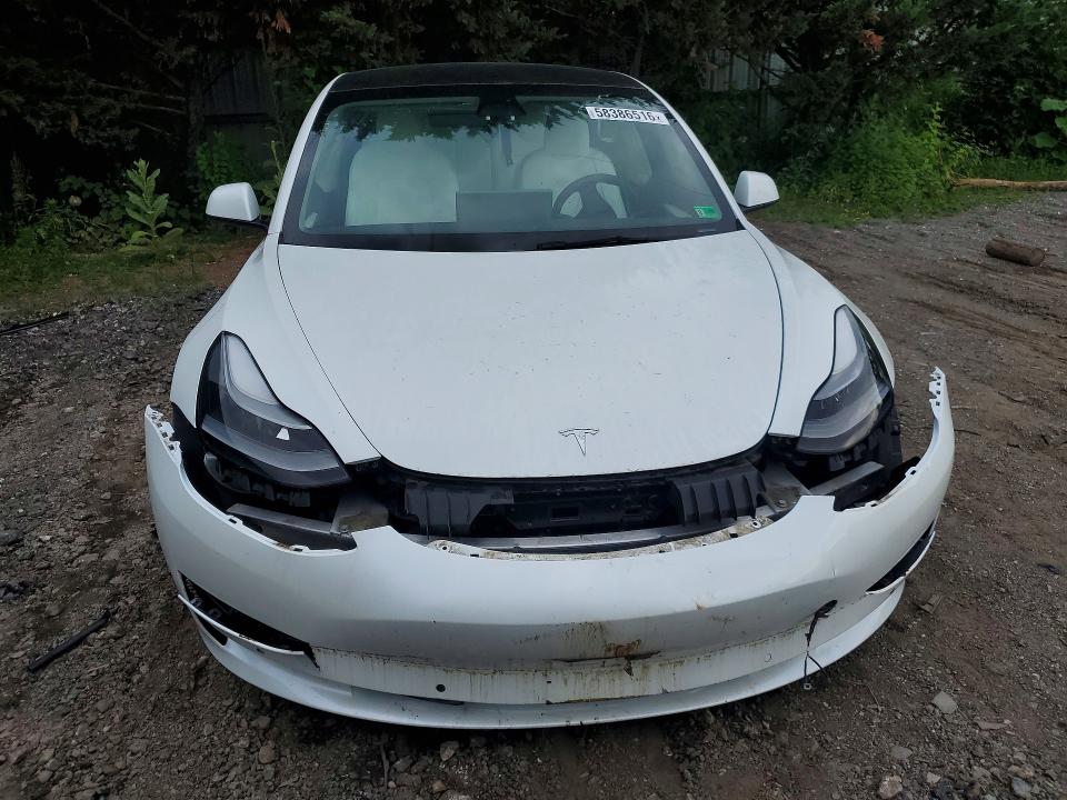 Photo 5 from auction – 2022 TESLA MODEL 3 with VIN 5YJ3E1EA5NF303404