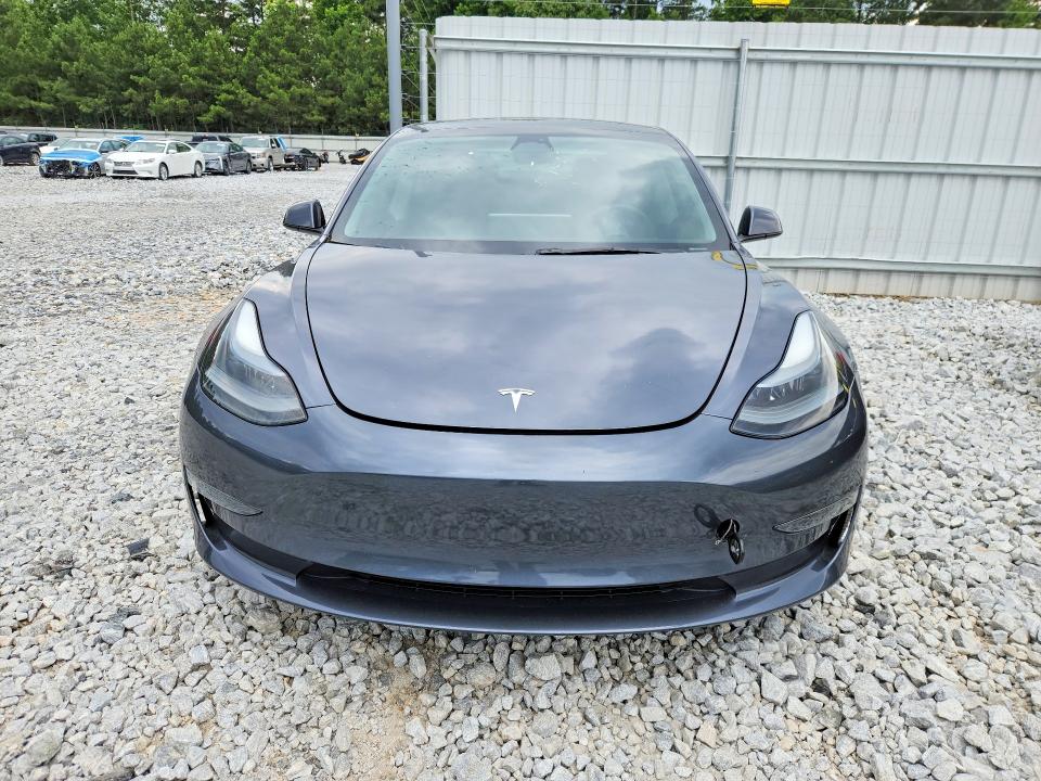 Photo 5 from auction – 2023 TESLA MODEL 3 with VIN 5YJ3E1EAXPF665943