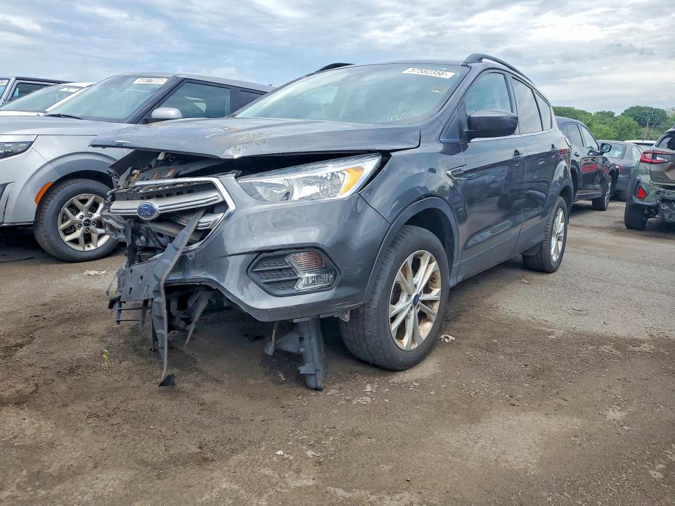 FORD ESCAPE 2018 with VIN 1FMCU0GD4JUD07073 - Photo from auction