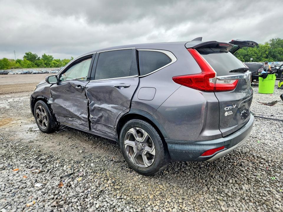 Photo 2 from auction – 2018 HONDA CR-V with VIN 7FARW1H59JE021349