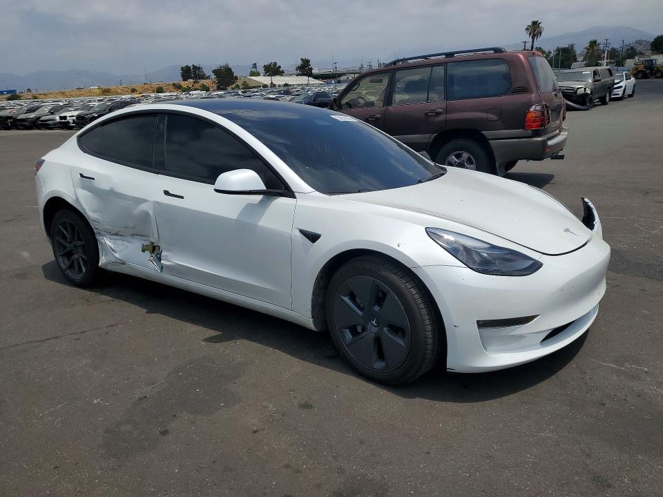 Photo 4 from auction – 2023 TESLA MODEL 3 with VIN 5YJ3E1EB4PF677806