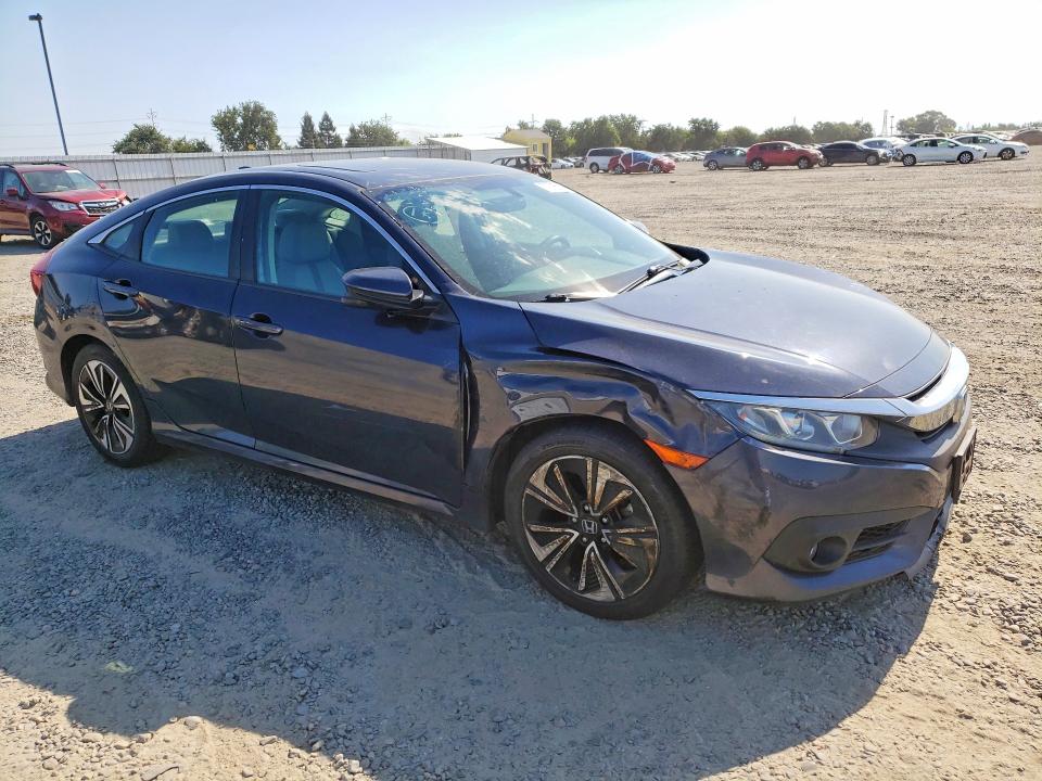 Photo 4 from auction – 2016 HONDA CIVIC with VIN 19XFC1F36GE215862