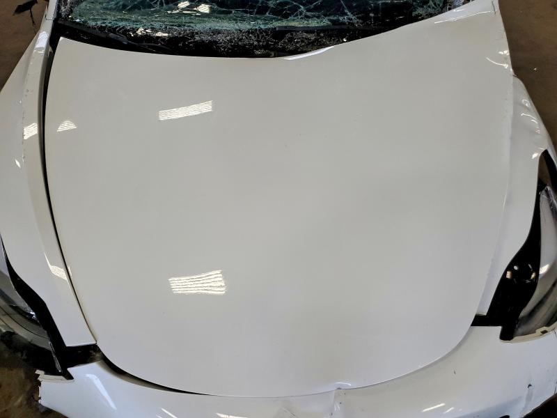 Photo 11 from auction – 2022 TESLA MODEL 3 with VIN 5YJ3E1EB1NF195808