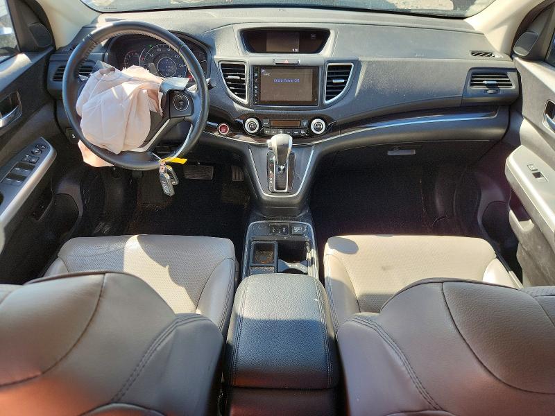 Photo 8 from auction – 2016 HONDA CR-V with VIN 5J6RM4H79GL123075