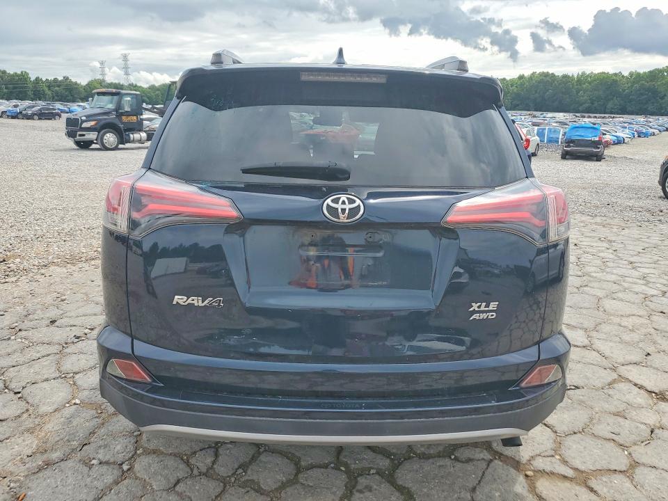 Photo 6 from auction – 2018 TOYOTA RAV4 with VIN JTMRFREV6JD238170
