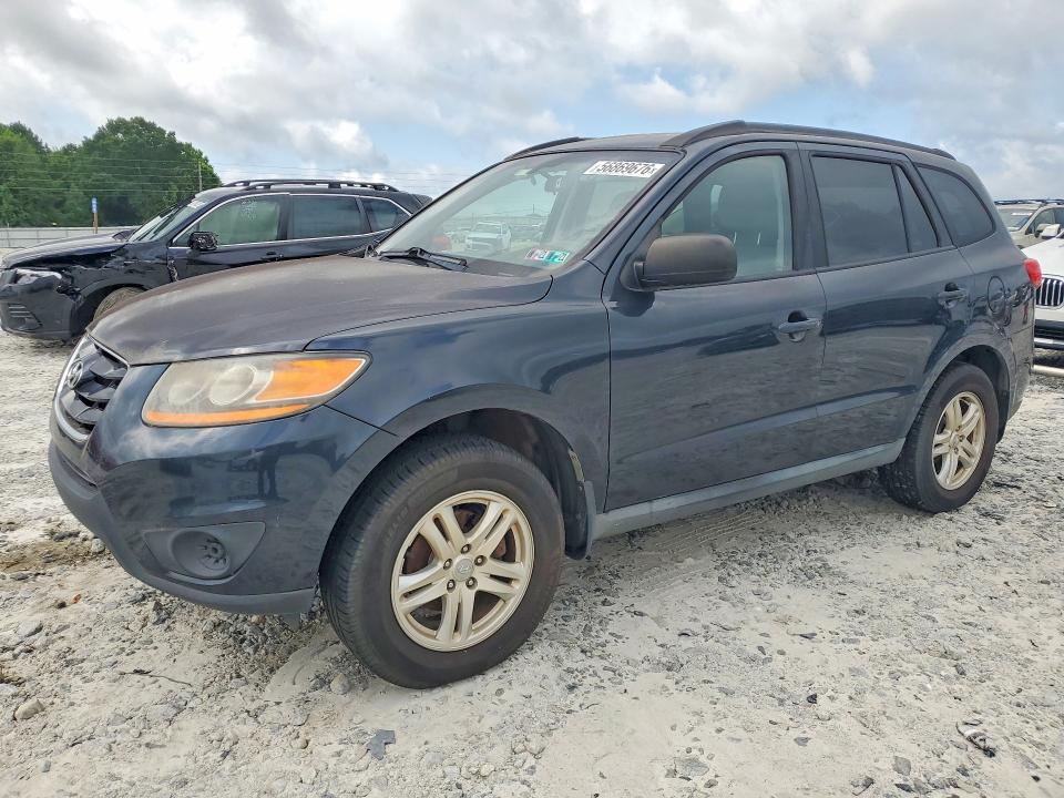 HYUNDAI SANTA FE 2010 with VIN 5NMSGDAB7AH407004 - Photo from auction