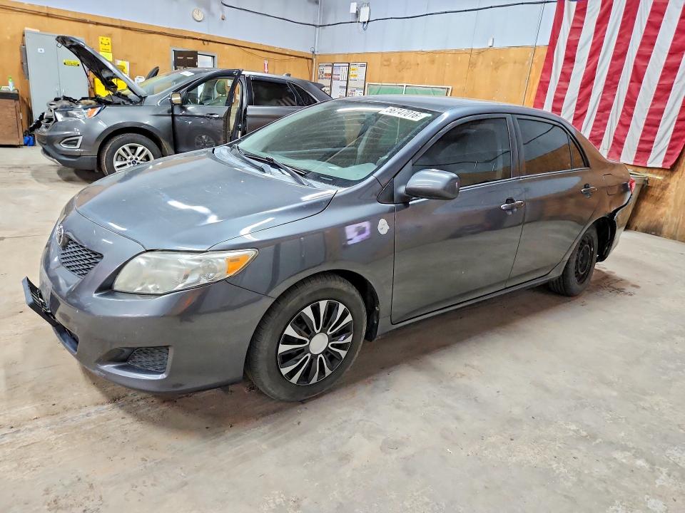 TOYOTA COROLLA 2010 with VIN 1NXBU4EE3AZ319052 - Photo from auction